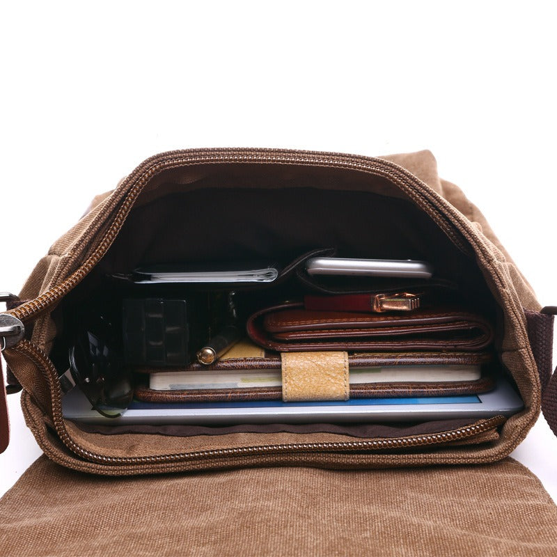 Inside of the canvas messenger bag with pockets