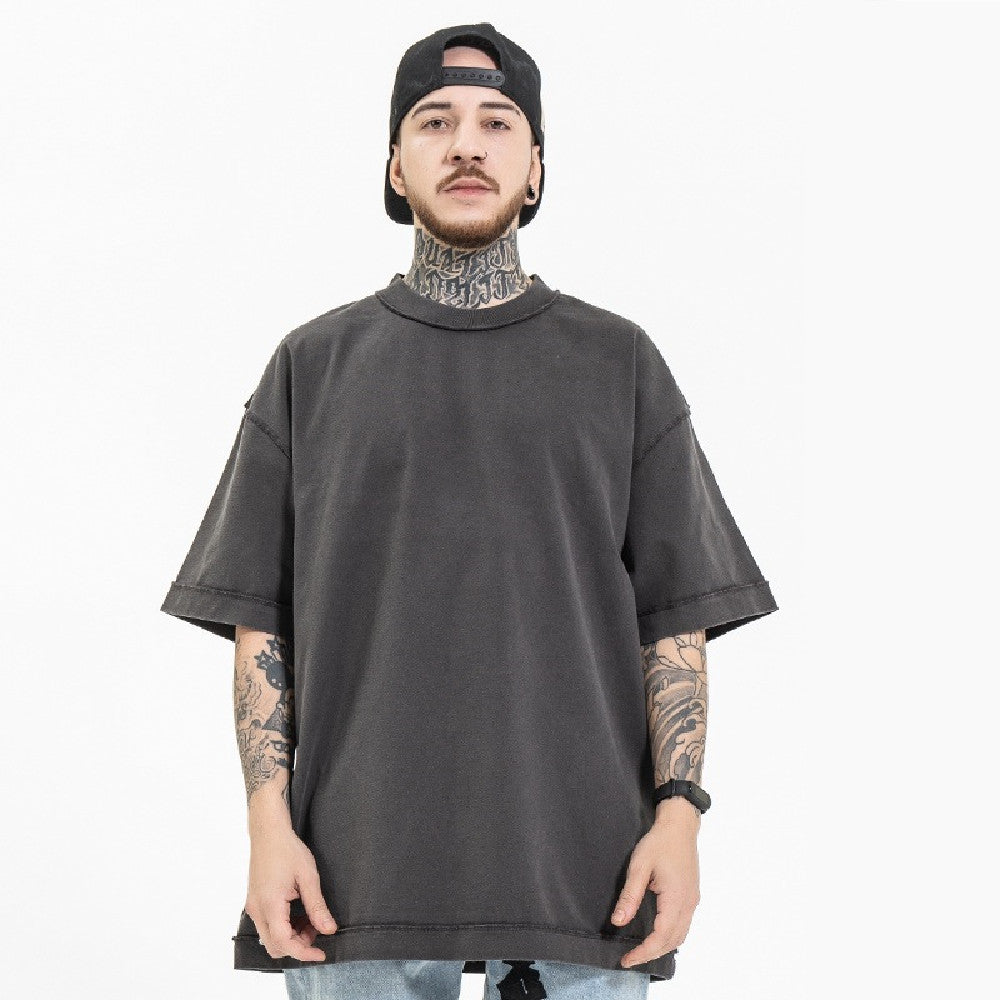Model wearing the heavyweight vintage-wash tee in grey