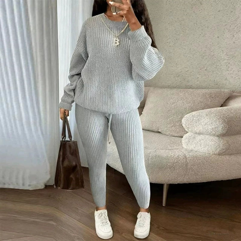 Ribbed knit pullover and trousers set in light grey