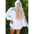 Aurelia Relaxed Long-Sleeve V-Neck Top