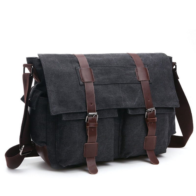 Large canvas messenger bag in black with two front pockets