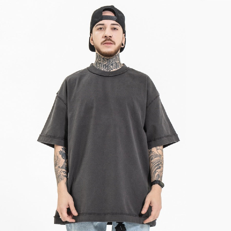 Model wearing the heavyweight vintage-wash tee in grey