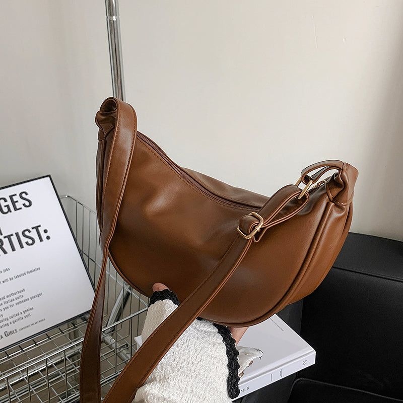 Half-moon crossbody bag in coffee