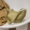 Half-moon crossbody bag in pea green